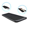 Black heat-resistant silicone mat designed to protect styling tools.