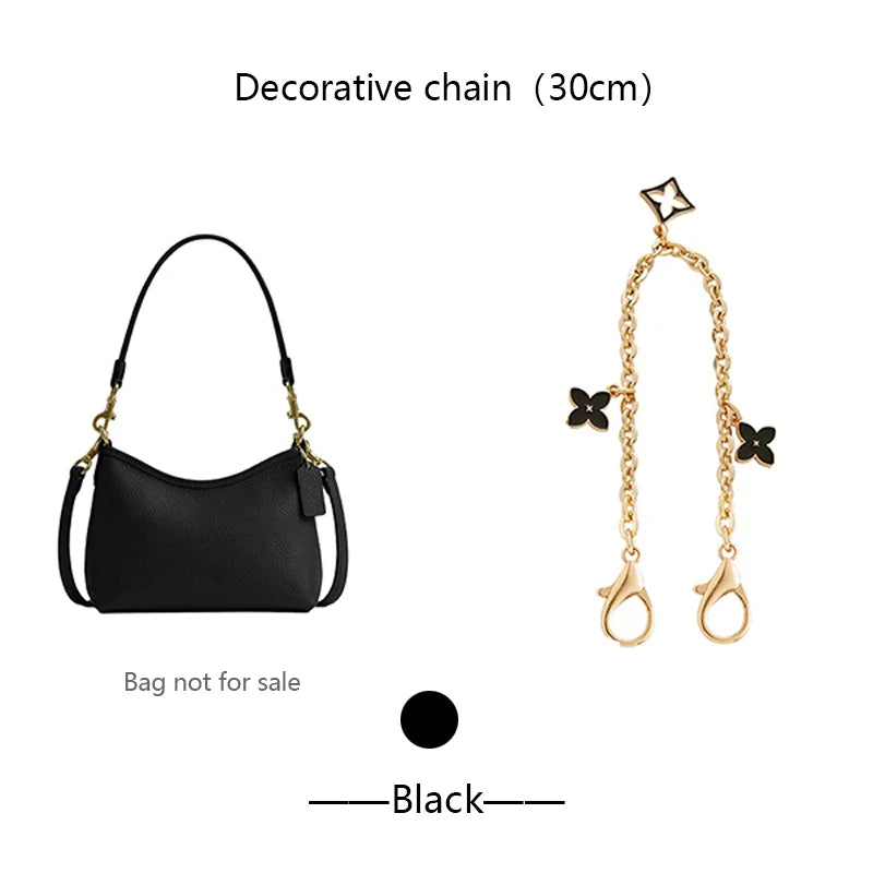 A black decorative chain measuring 30cm with charms and gold-toned clasps.