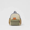 A light beige canvas shoulder bag featuring a Snoopy cartoon design and a gray strap.