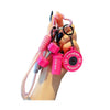A hand holds a pink fitness keychain featuring charms of a dumbbell and kettlebell.