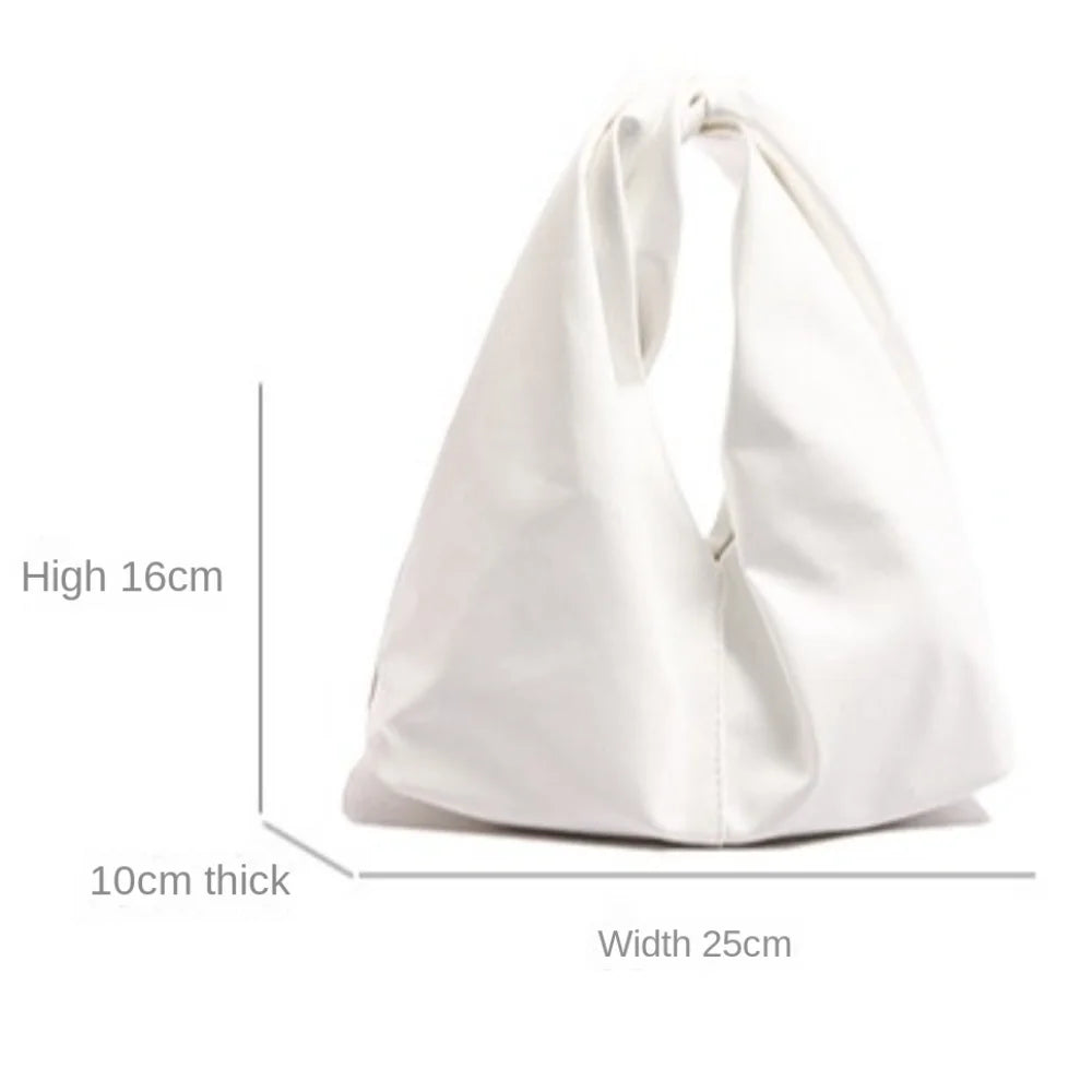 White minimalist crossbody tote bag shown with dimensions of 16cm high, 10cm thick, and 25cm wide.