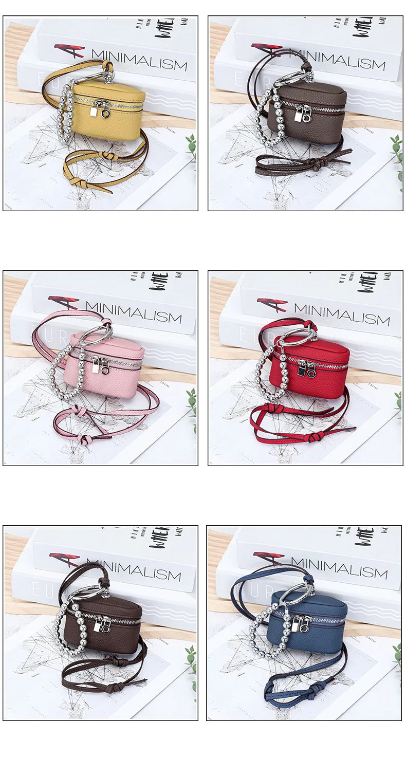 A collection of handcrafted leather neck pendant coin purses in various colors and styles with leather lanyards.