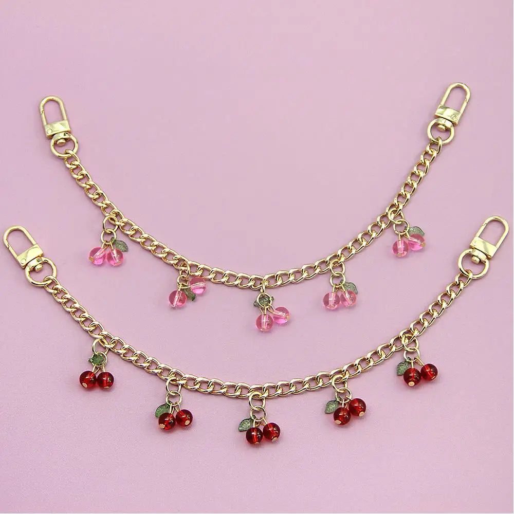 Gold chain necklace with pink and red gemstone pendants for bags and clothing