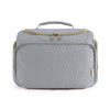 A light gray cosmetic organizer bag with a quilted pattern and a gold-toned zipper and handle.