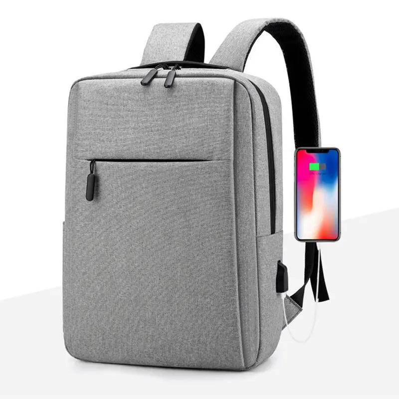 A gray versatile USB-rechargeable laptop backpack with black straps shown from the front.