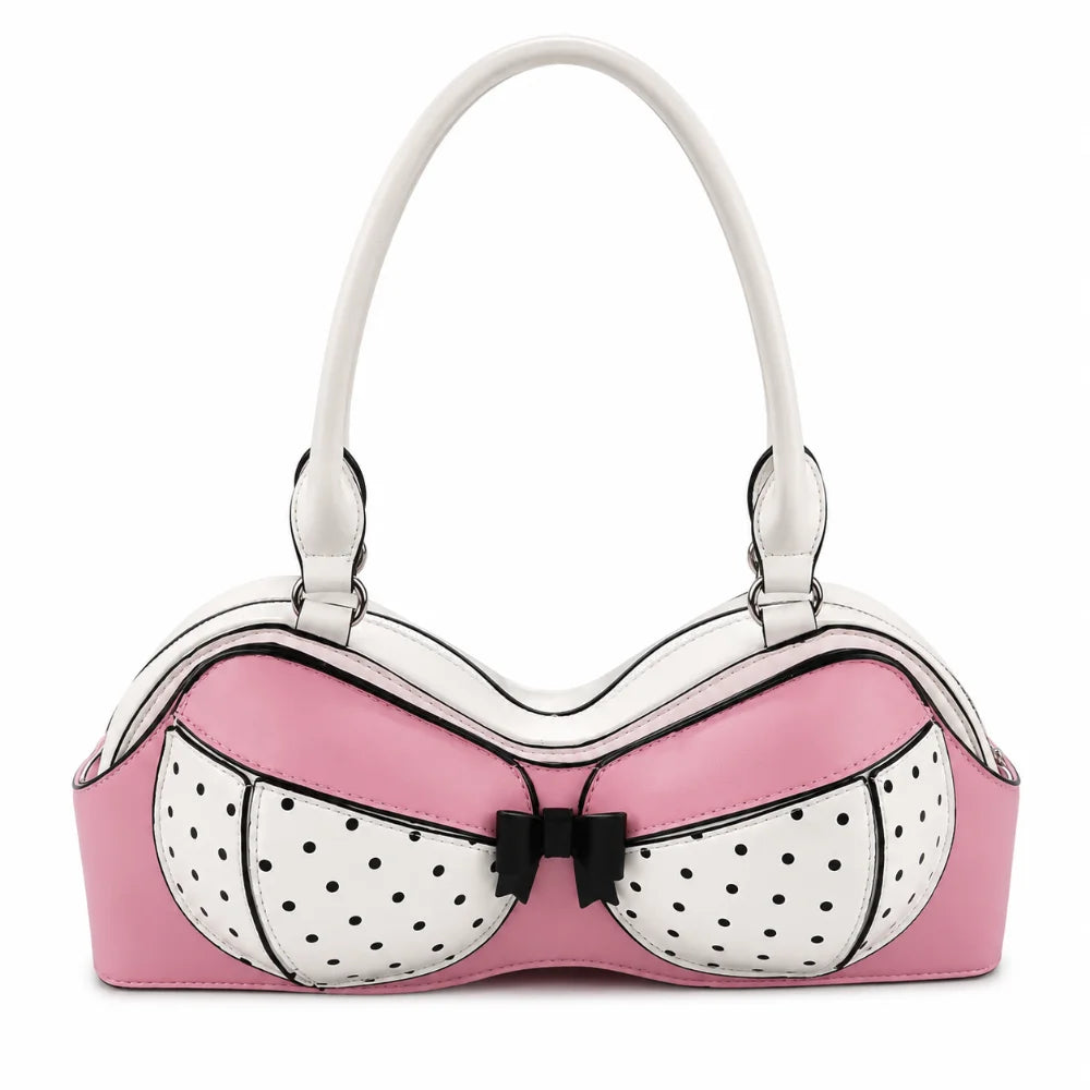 A pink bra silhouette shoulder bag with white polka dots and a bow detail.