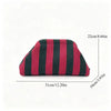 A maroon and black striped knit cloud makeup bag shown from the side.