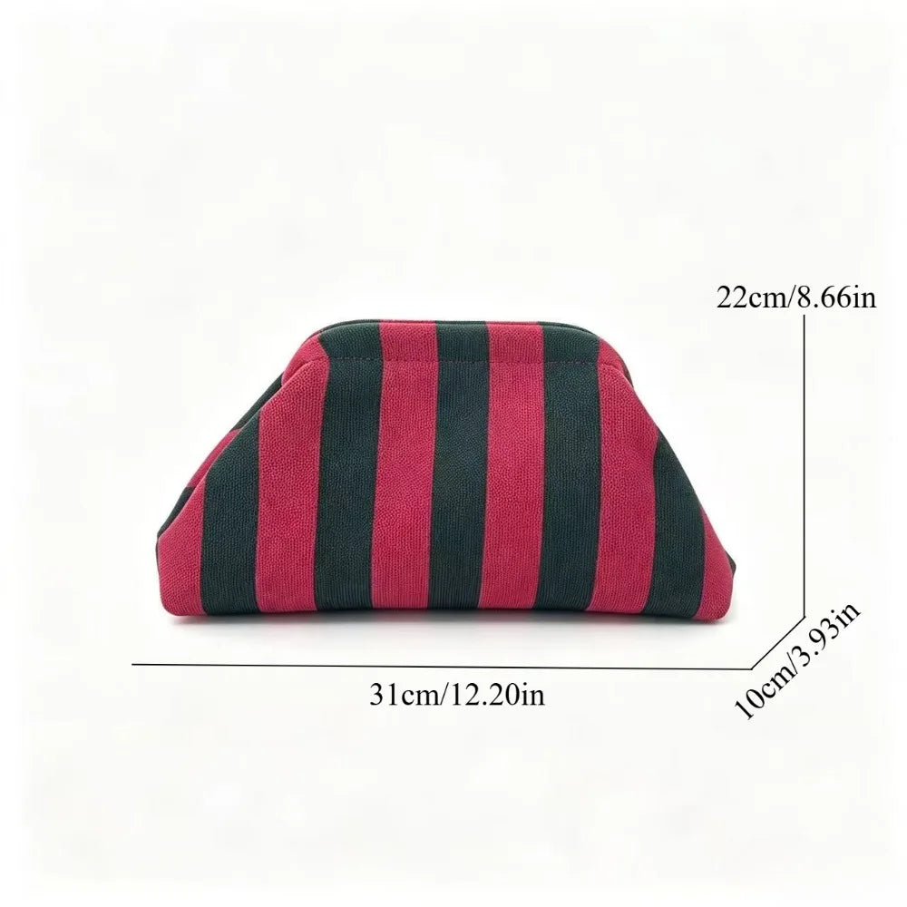 A maroon and black striped knit cloud makeup bag shown from the side.
