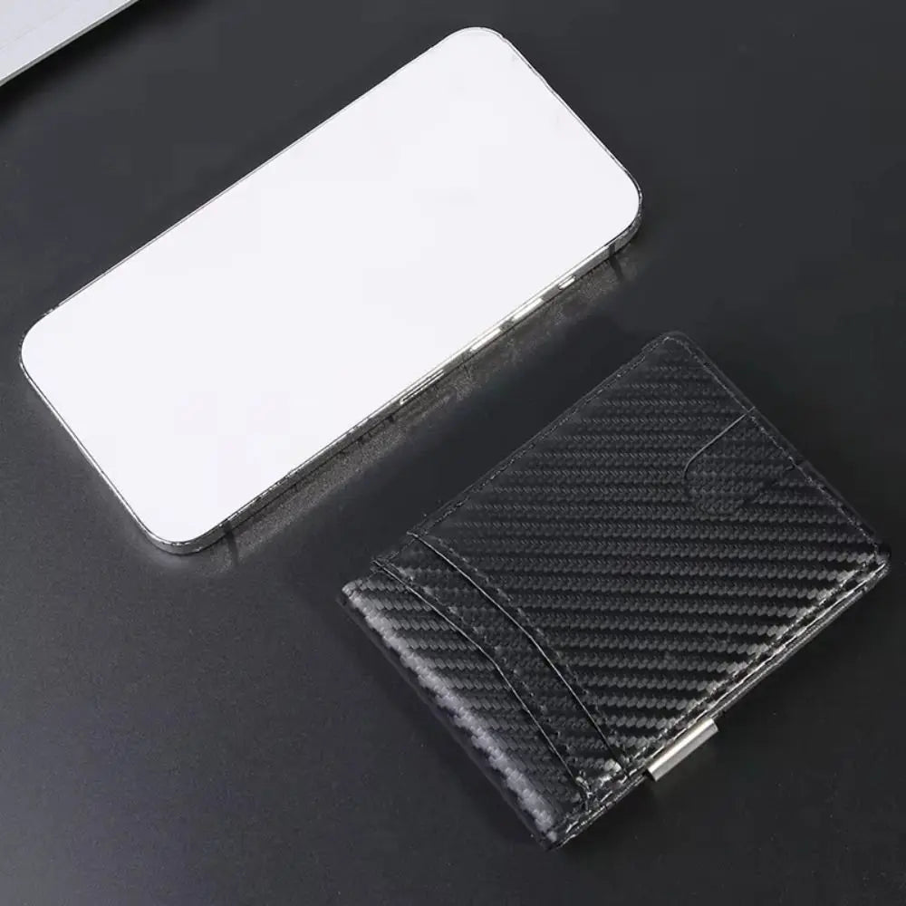 A slim black wallet with a textured cover is shown next to a blank white card holder.