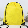 Yellow gym drawstring backpack with black trim and straps