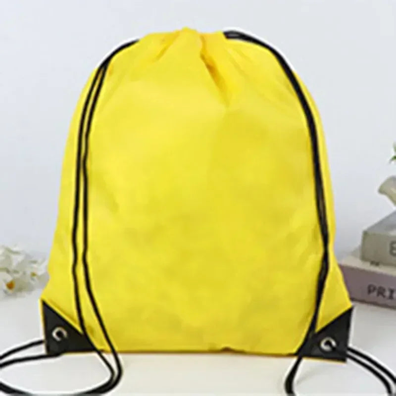 Yellow gym drawstring backpack with black trim and straps