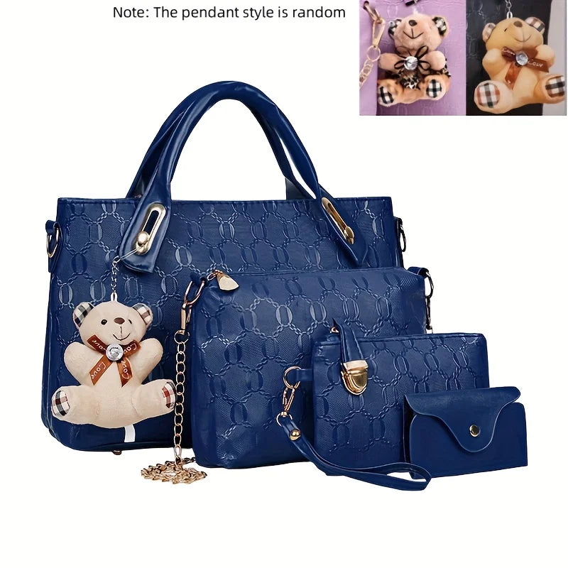 A navy blue embossed PU handbag set featuring a main bag and a small wallet, with a bear pendant style.