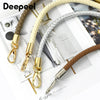 A close-up of a PU leather replacement bag strap with metal buckles in beige and brown colors.