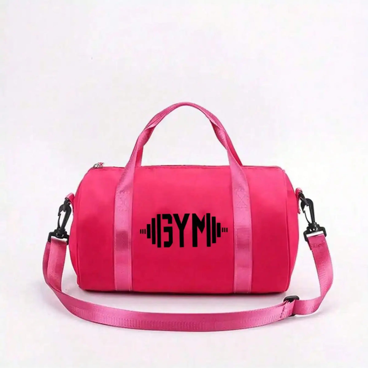 Sac de sport rose vif avec texte noir indiquant GYM sur une sangle rose.