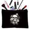 Black makeup pouch featuring a detailed skull and rose design with various cosmetic bottles.