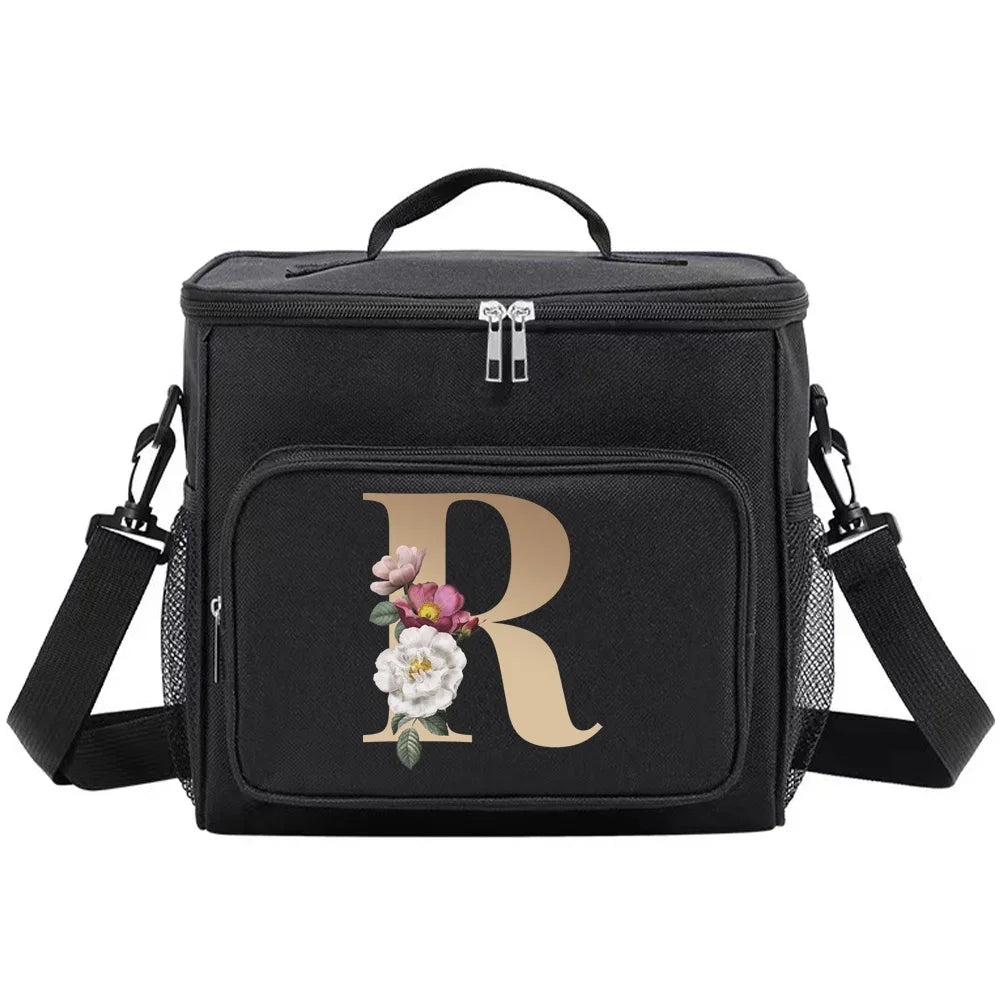 Black insulated canvas lunch bag with a gold initial R and dual handles