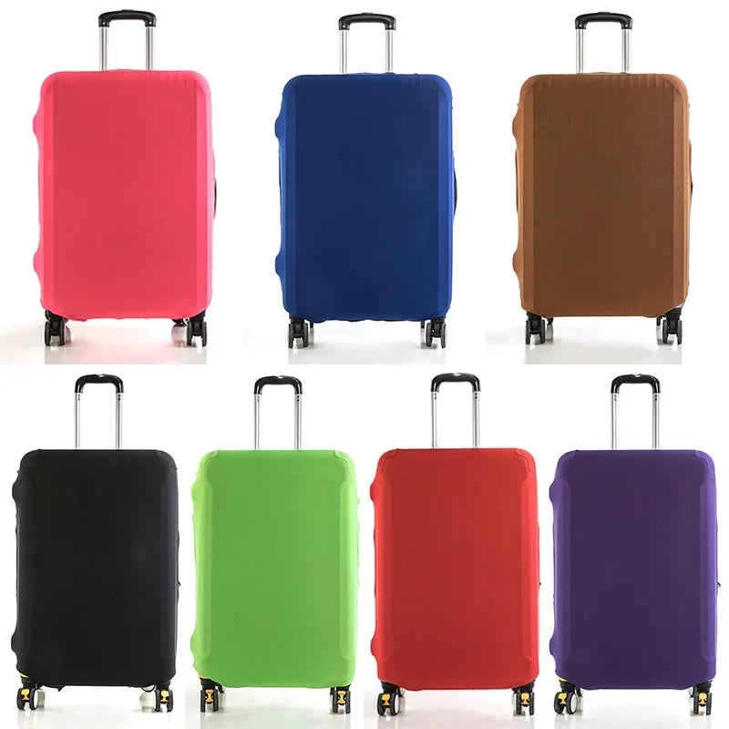 A row of five luggage protectors in various colors including pink, blue, brown, black, and purple.