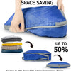 A hand is shown compressing a blue reusable packing cube, demonstrating space-saving features.