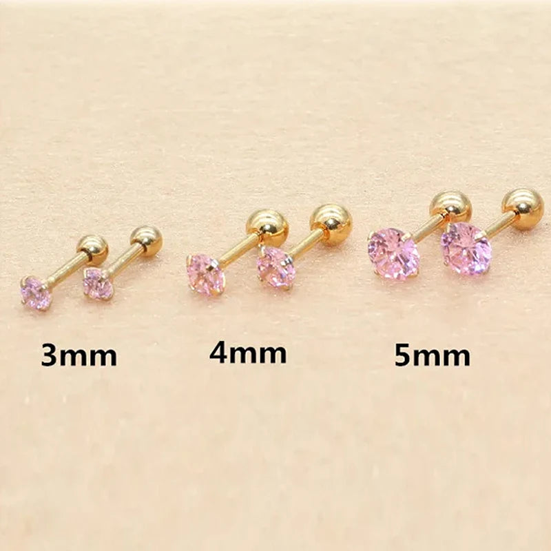Set of gold-toned stainless steel ear stud earrings in various sizes 3mm, 4mm, and 5mm with pink stones