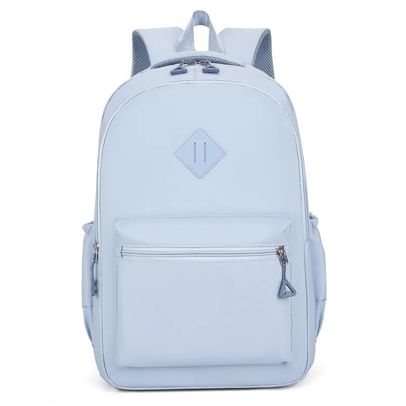 Light blue durable nylon commuter backpack with gray accents