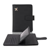 A black PU leather passport holder with credit card slots and a flap closure.