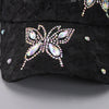 Black mesh snapback baseball cap decorated with sparkling floral embroidery