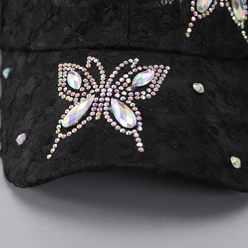 Black mesh snapback baseball cap decorated with sparkling floral embroidery