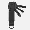 Porte-clés organiseur métallique noir minimaliste à lame fendue.