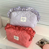 Red and white checkered makeup pouch with ruffled lace trim