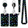 A black badge reel with a silver clip and a purple floral patterned lanyard attached to a neck strap.