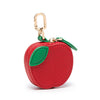 A red apple-shaped coin purse keychain with a green leaf detail.