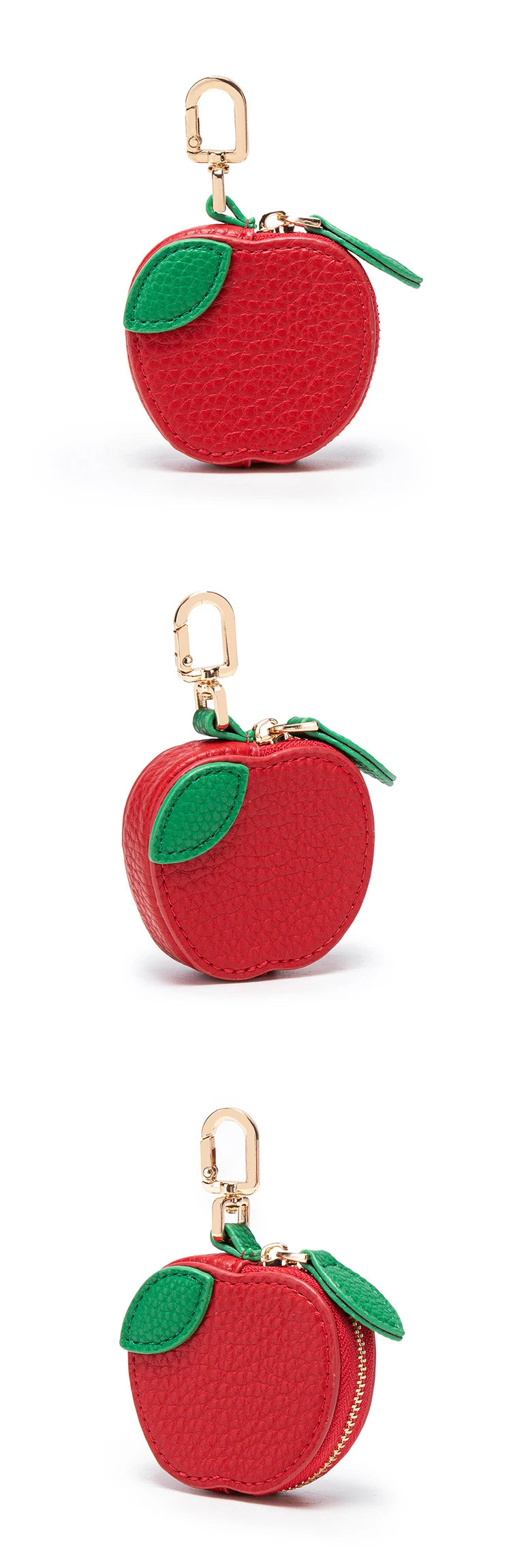 A red apple-shaped coin purse keychain with a green leaf detail.