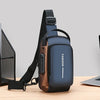 A dark blue and brown durable men's oxford sling bag is shown on a wooden surface.