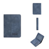 A set of dark blue leather accessories including a slim wallet, card holder, and leather strap.