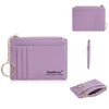 A lavender leather card holder wallet with a zipper closure and gold chain detail.