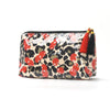 A cosmetic travel pouch featuring a leopard print and red fruit pattern with black lining and orange fringe.