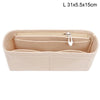 Light beige felt bag insert organizer with a zipper and a small charm
