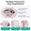 Pink tote bag showing multiple interior and exterior pockets including a front zippered pocket and a padded laptop compartmen