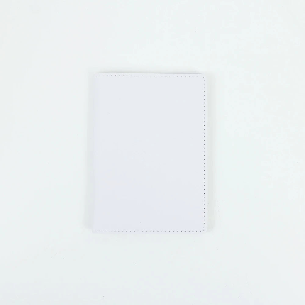 A blank white PU leather passport holder with stitched edges.