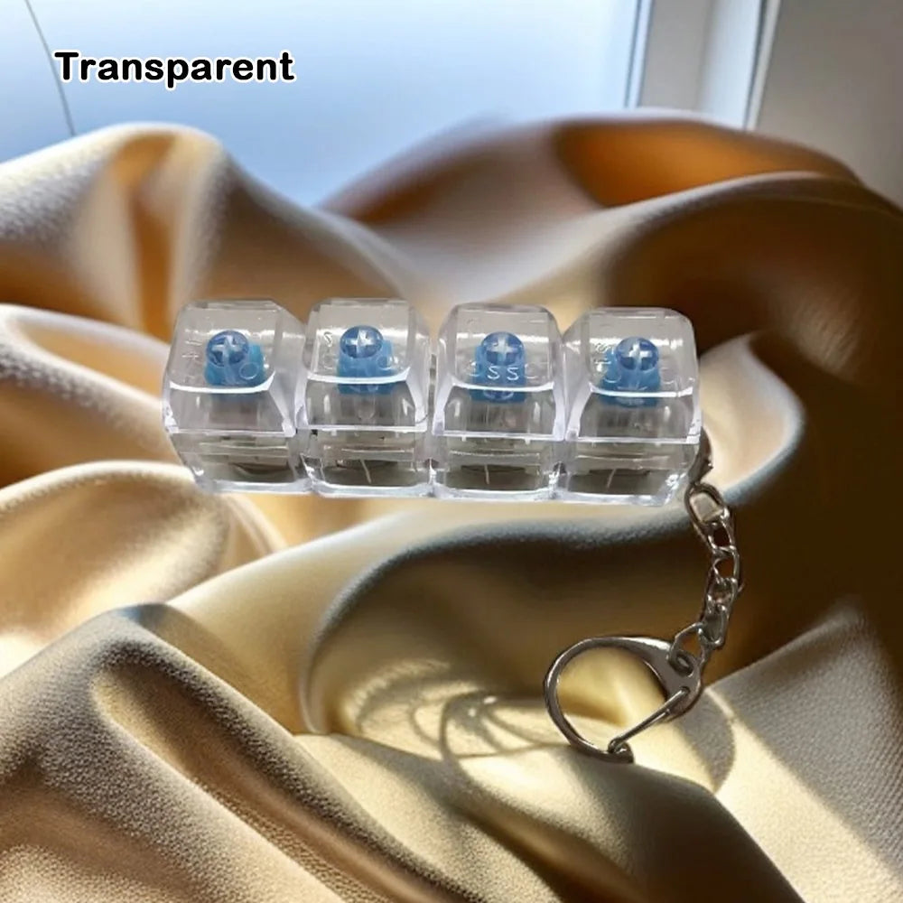 Clear silicone fidget toys with blue accents are displayed on a silky fabric.
