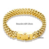 A close-up view of a chunky gold link chain bracelet with a hinged clasp and a 11mm width.