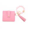 Pink silicone bead bracelet attached to a pink leather card holder.