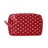 A red cosmetic storage bag with white polka dots, shown from the front.