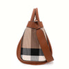 Caramel-Karo-Kuhsh 등으로esetote mit braunem Lederriemen und kariertem Stoffdetail