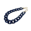 A dark blue acrylic chain bracelet with gold-colored clasps.