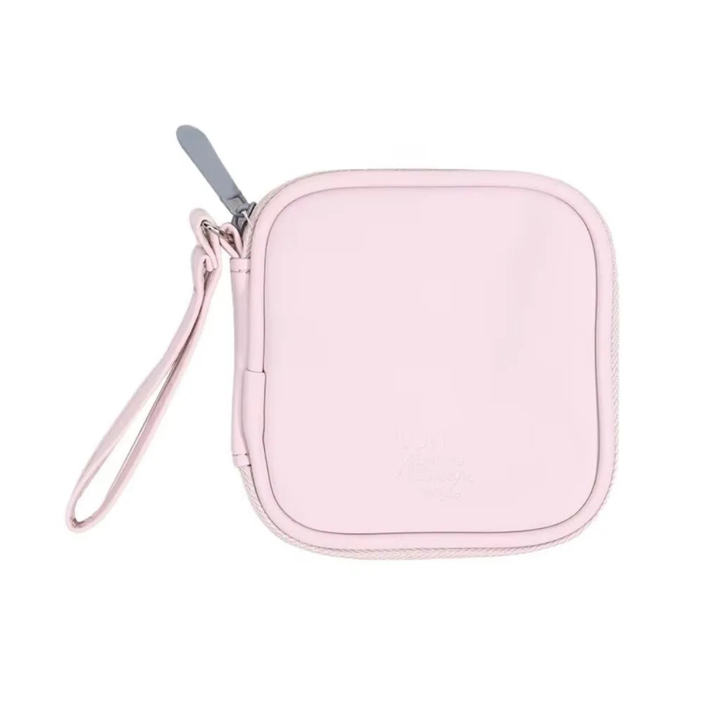 Bolsa portátil rosa multifuncional para almacenamiento de auriculares con cierre de cremallera.