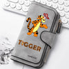 A gray zippered pouch featuring an orange and black tiger illustration and the word forever on the front.