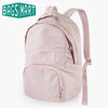 A light pink waterproof anti-theft laptop backpack with a beige strap and fabric details.