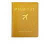 A yellow PU leather passport holder with the word PASSPORT and a small airplane icon embossed on the cover.