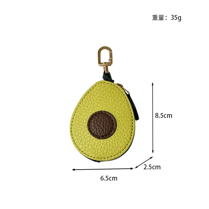 Yellow fruit-shaped PU leather coin purse keychain with a gold-colored ring.